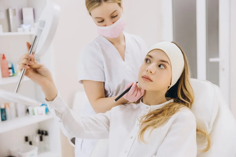 injector talking to client about getting Botox, filler or both