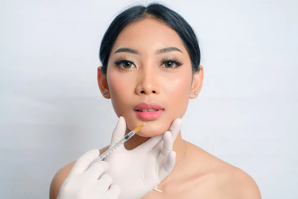 woman about to use Hyaluronidase to dissolve filler in Washington DC