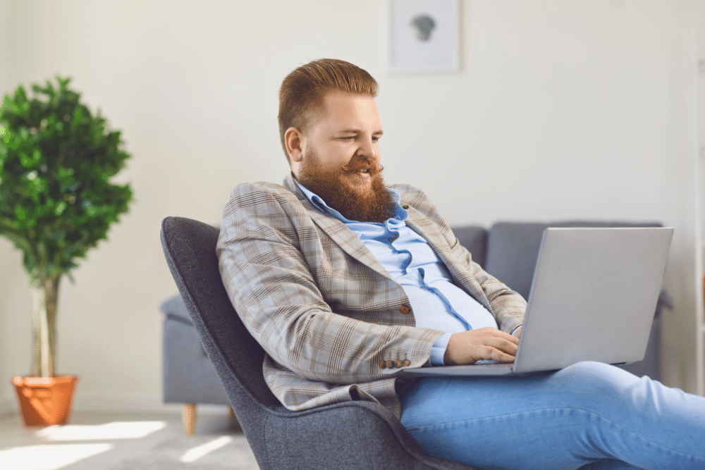 man researching liposuction with fat transfer cost in Washington DC