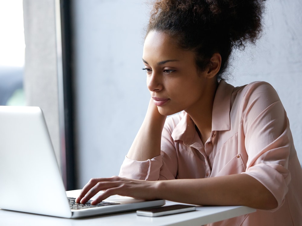 woman researching RF microneedling pricing in Washington DC