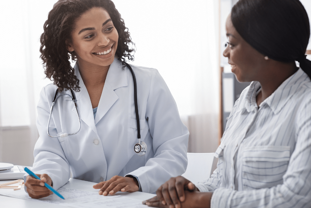 doctor explaining skin tightening for African-American skin in DC