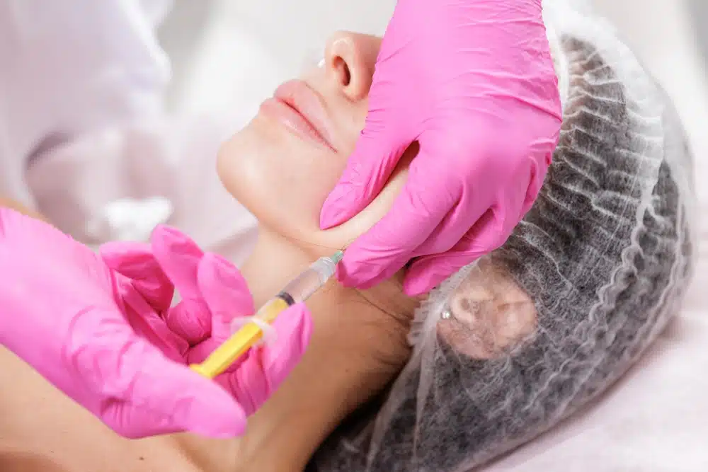 woman getting jawline filler treatments in DC