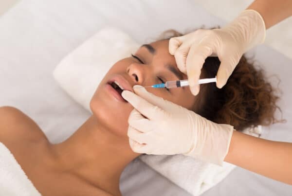 woman trying the best lip filler for black women in DC